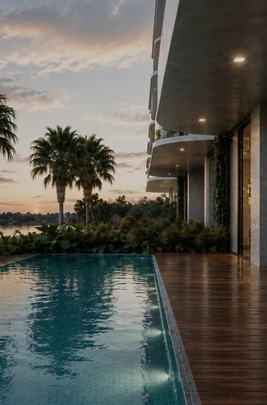 Garden Condos poolside deck at sunset
