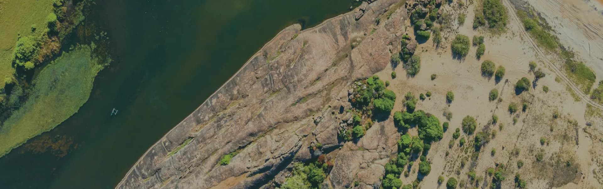 Aerial view of Arugam Bay's coastline and lagoon