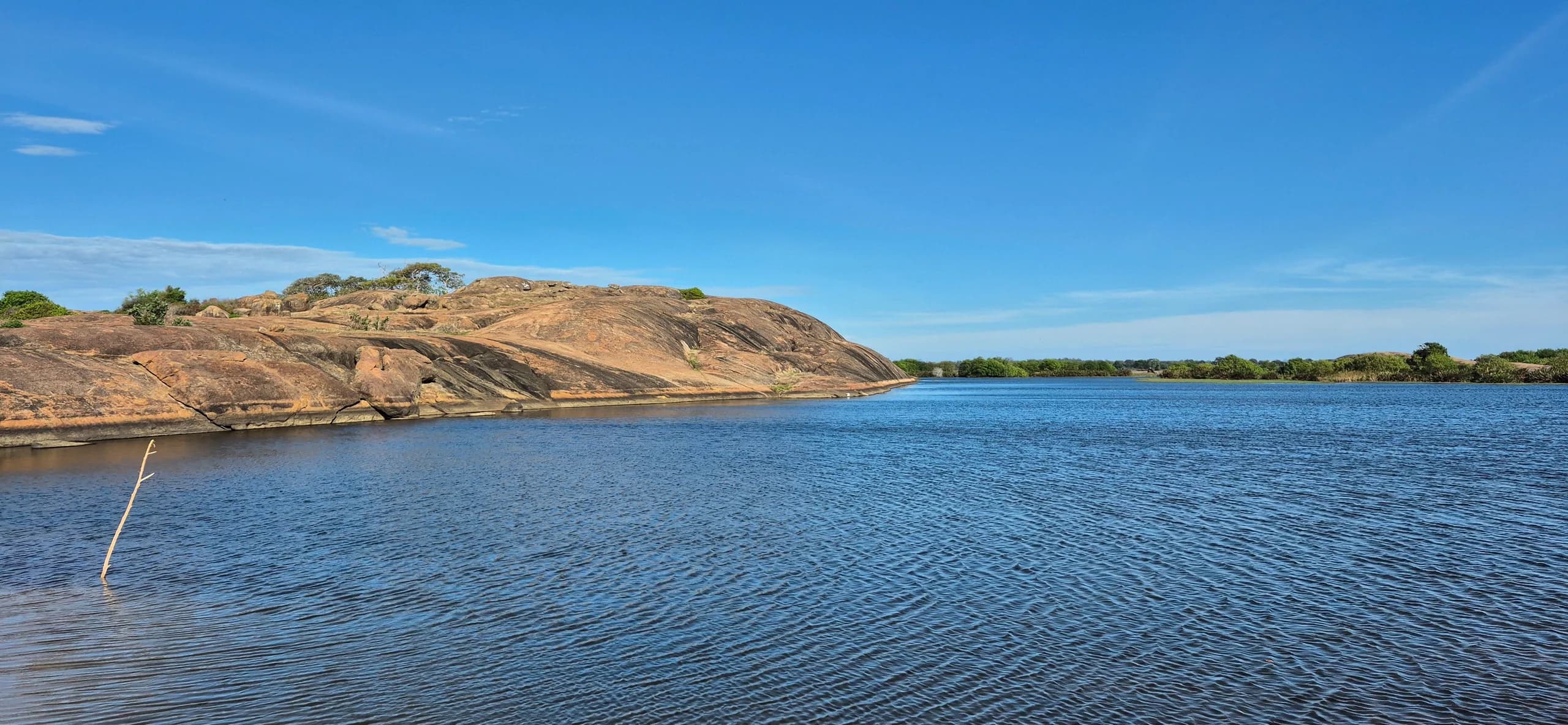Aerial view of Arugam Bay's coastline and lagoon