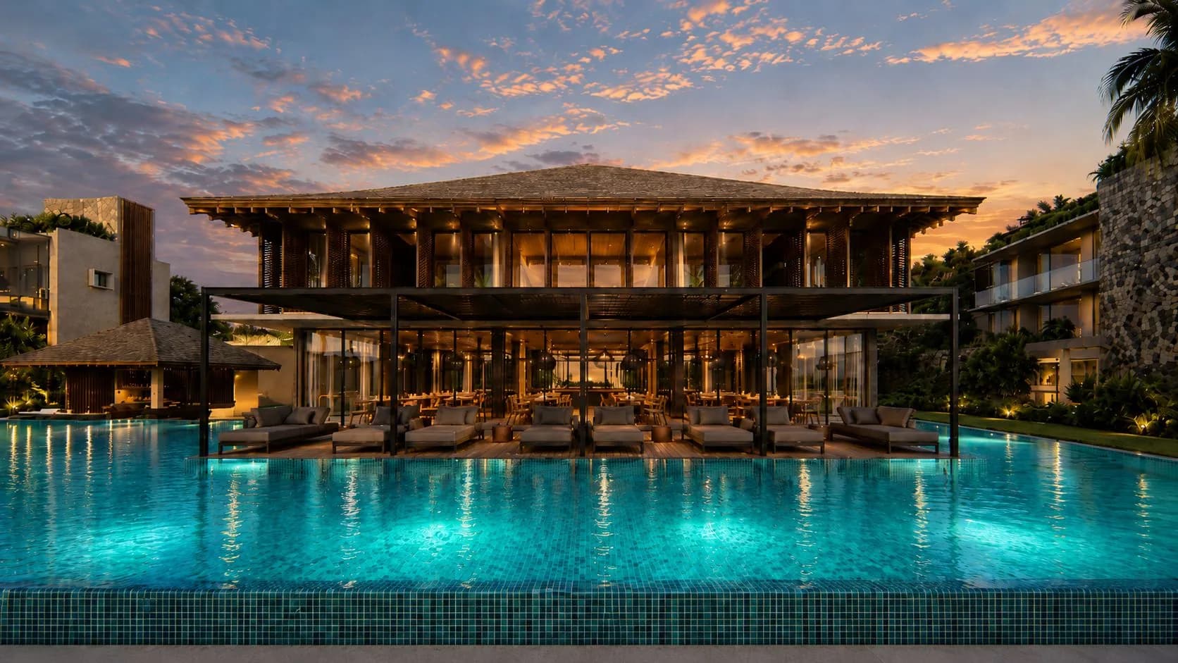Aaru's clubhouse and pool deck at sunset